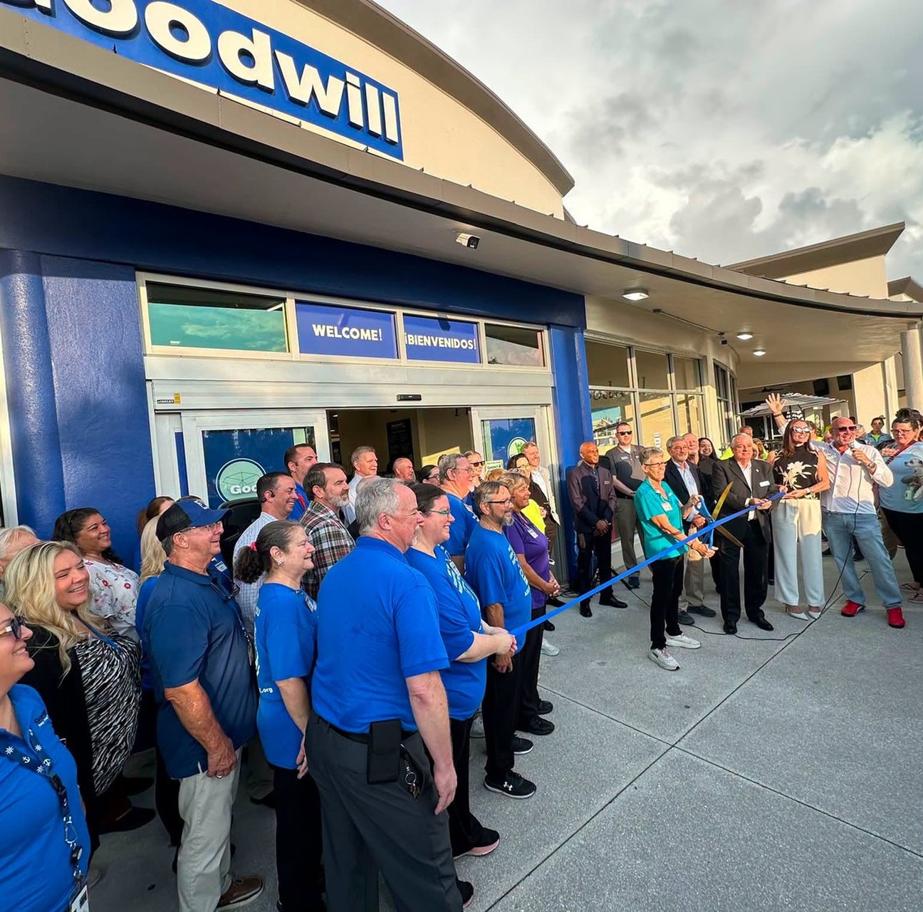 Goodwill staff and officials cutting the ribbon at the new Punta Gorda store