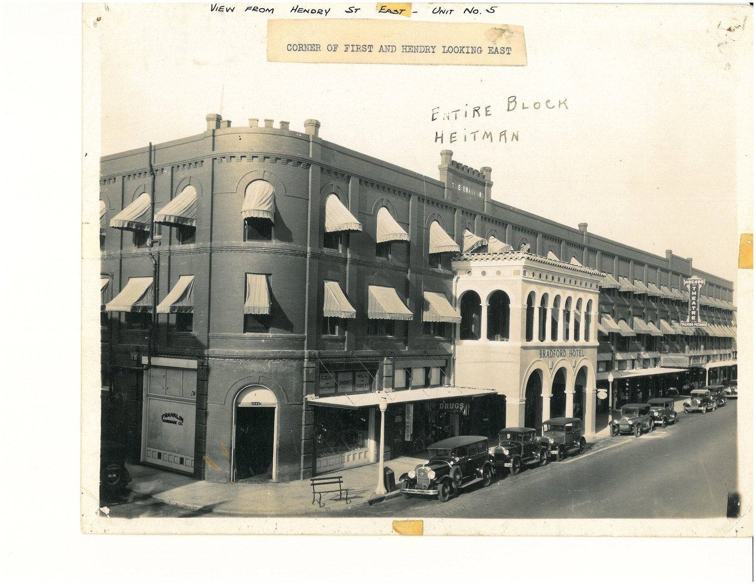 The Heitman block at First and Hendry streets looking east