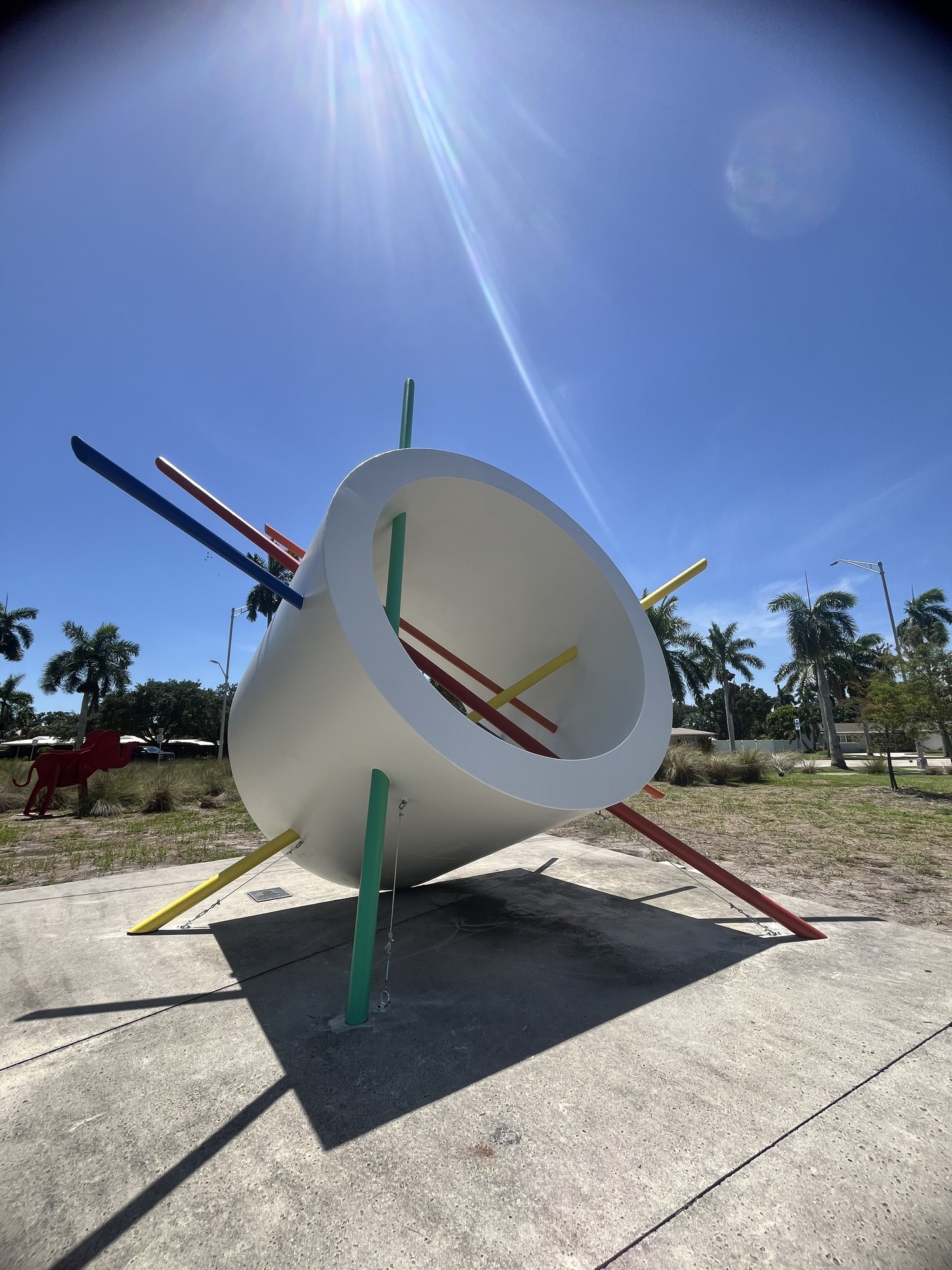Restored You Are Here sculpture with red, yellow, green and blue rods
