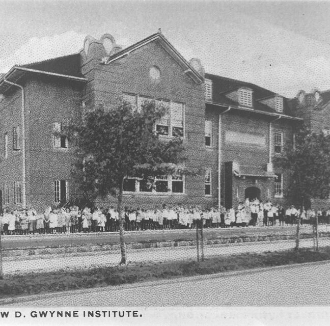 Historic photo of the Andrew D. Gwynne Institute with students gathered outside